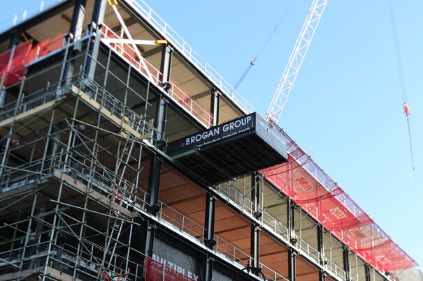 crane deck out the side of a building creating a platform